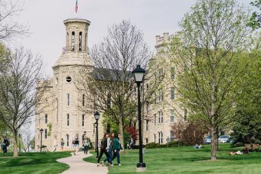 Blanchard Hall with students walking on Wheaton College Campus