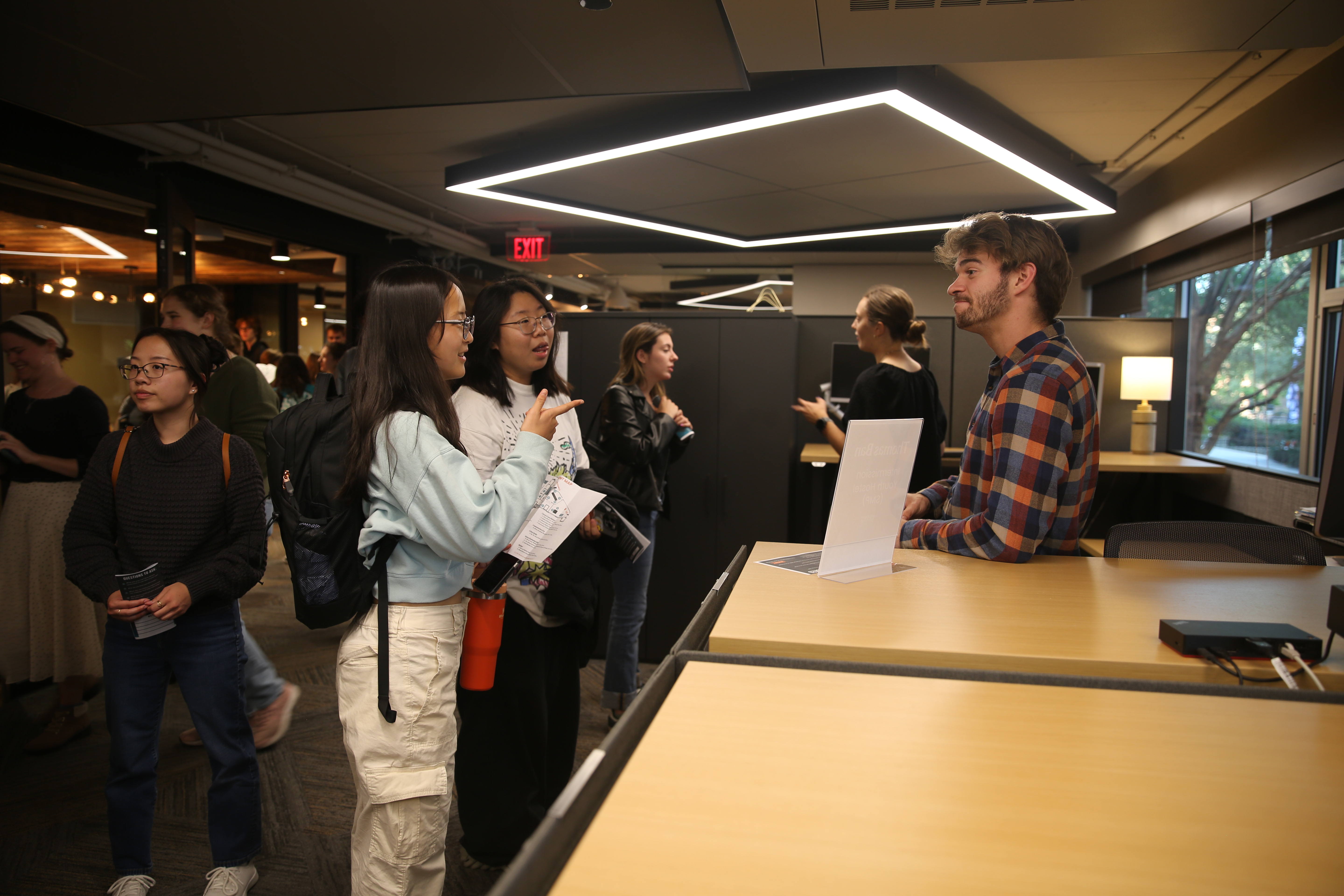 Students chatting with presenter at CVC event