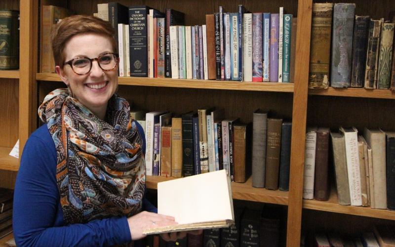 woman holding a book