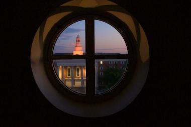 View of a window with Billy Graham Center in the background