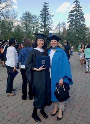 A Professor and Graduate Student at commencement