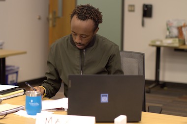 Student working at his computer