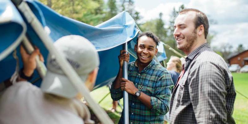 Young Men Putting up a Tent at HoneyRock