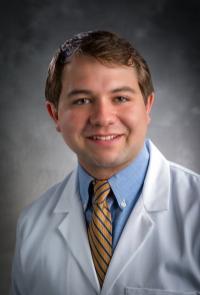 Matt Fenlason portrait in lab coat