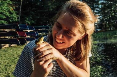 olivia with a frog at honeyrock