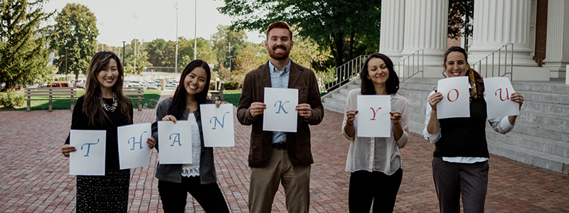 800x300 Holding thank you sign