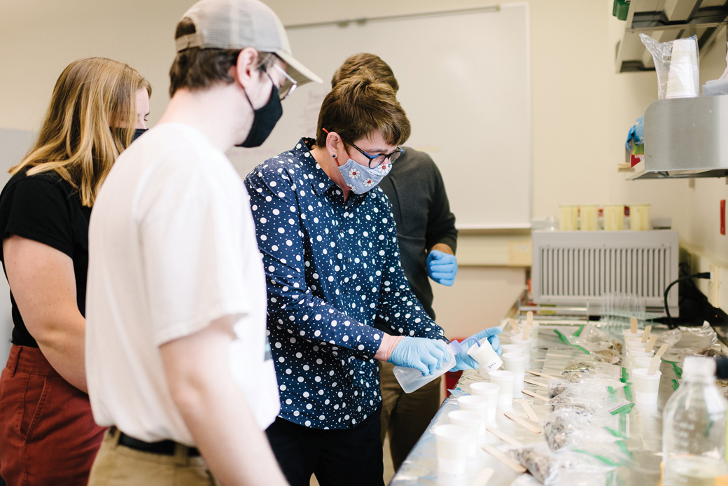 Wheaton College IL Professor Dr. Kristen Page with Students in Biology Lab