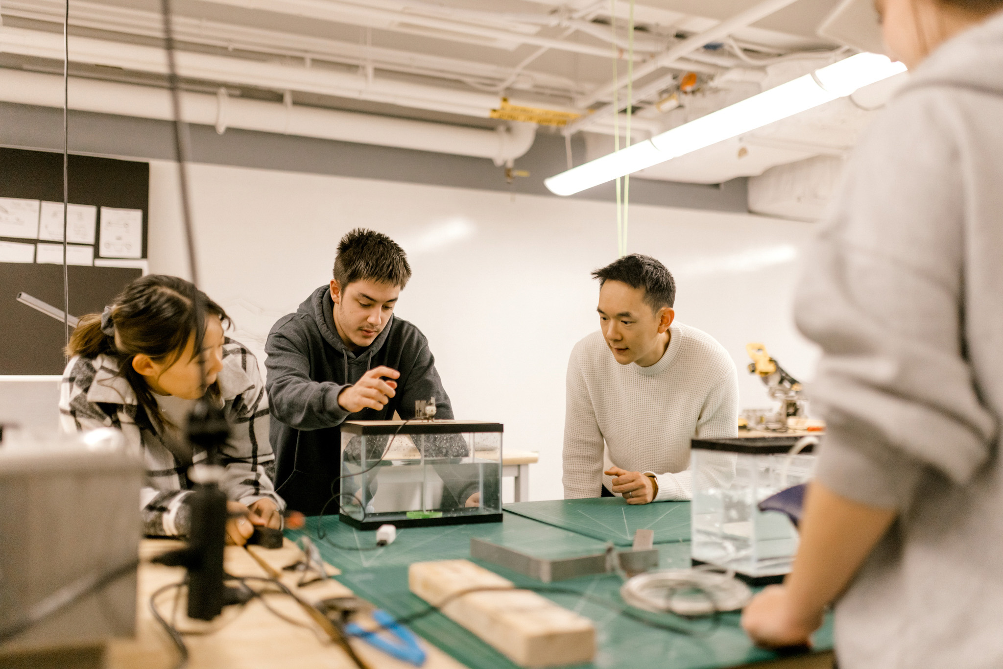 Wheaton College IL undergraduate students and faculty in the engineering lab