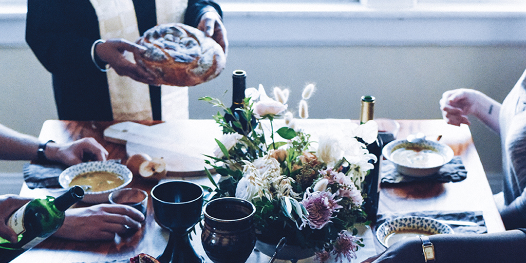 1080x540 Winter 2022 magazine table setting with food and people