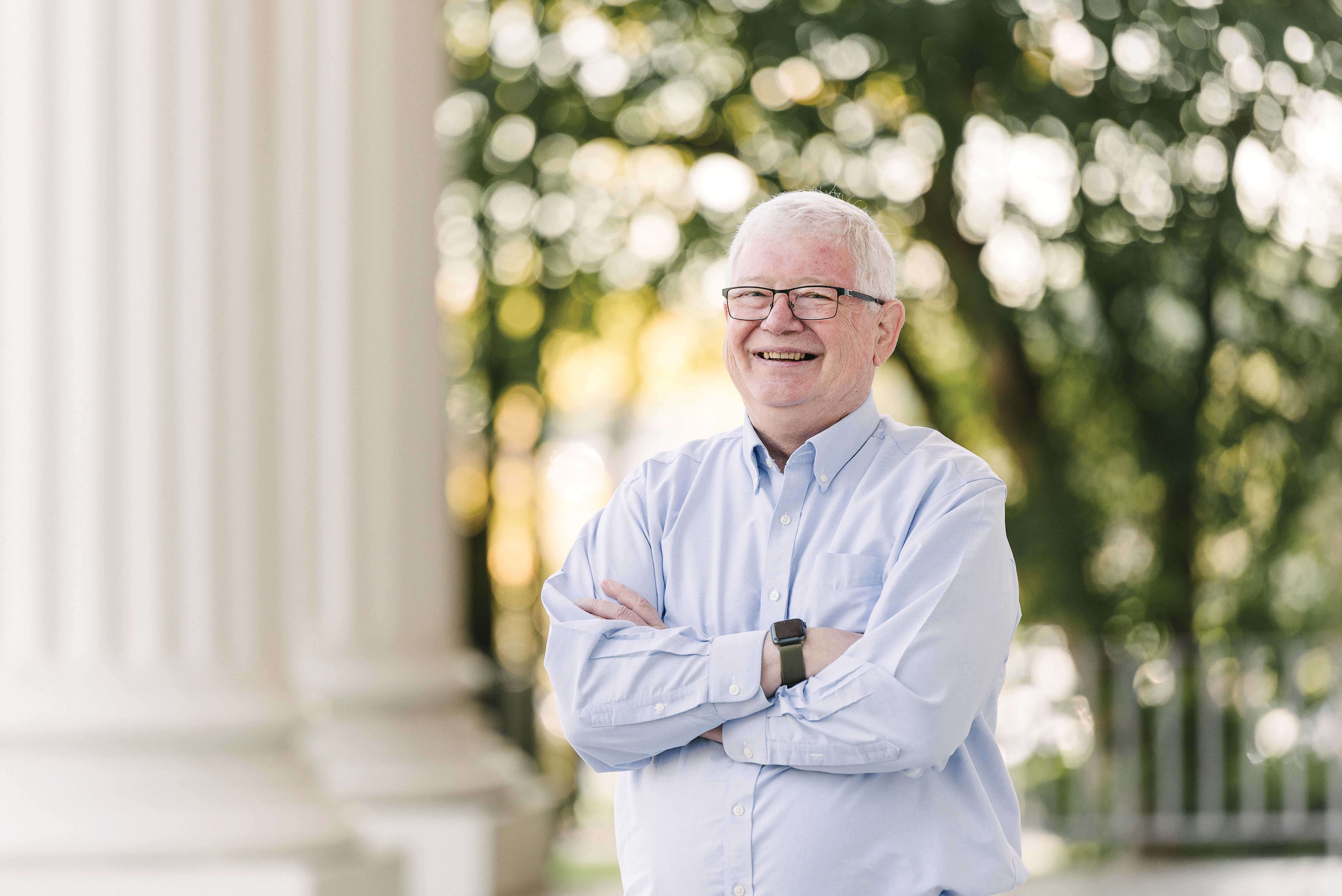 Wheaton College IL Alumnus of the Year for Distinguished Service to Alma Mater, Scott Moreau in front of Billy Graham Hall