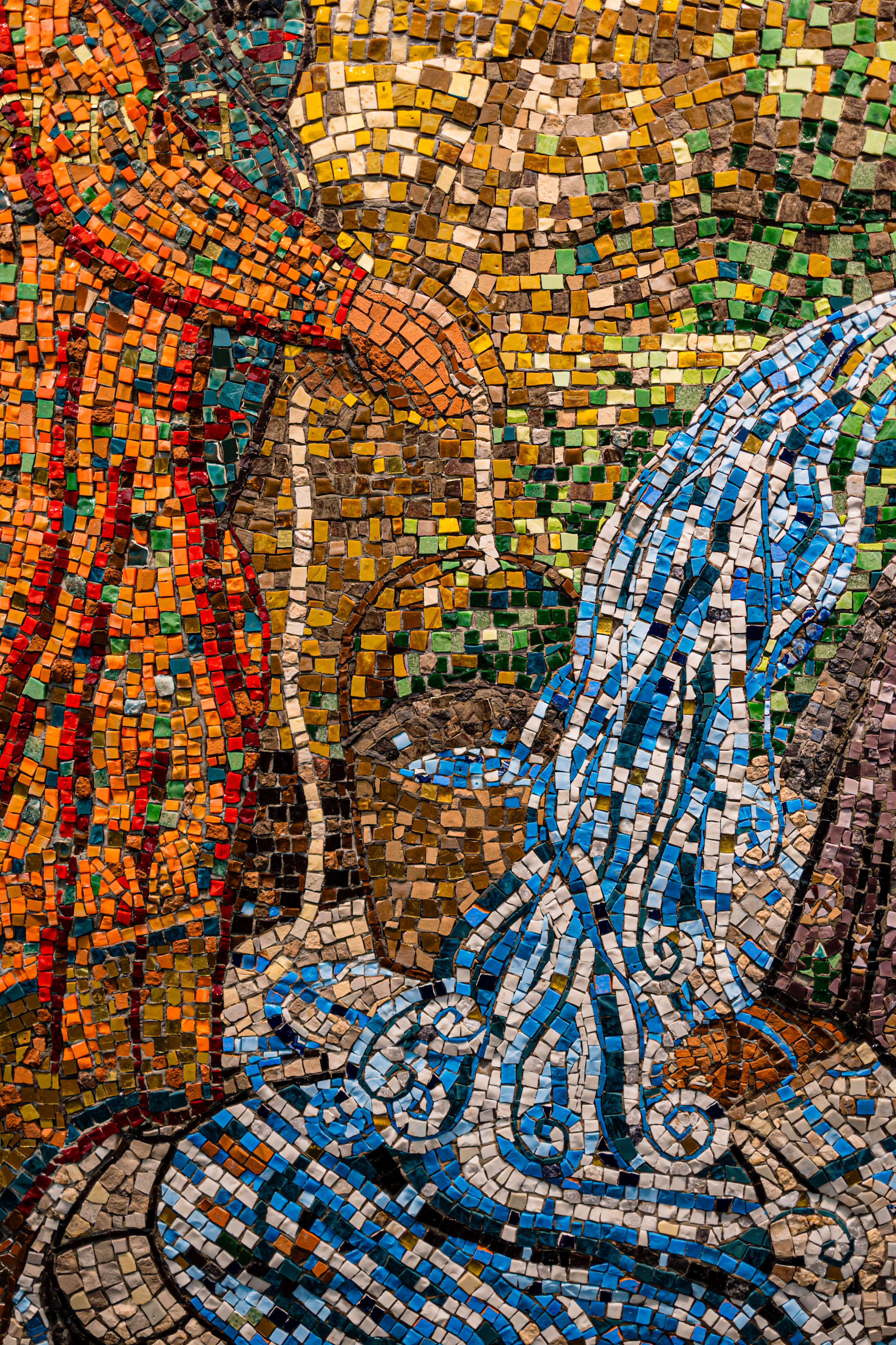 Close up of multicolored mosaic tiles from The Luminous One display at Wheaton College