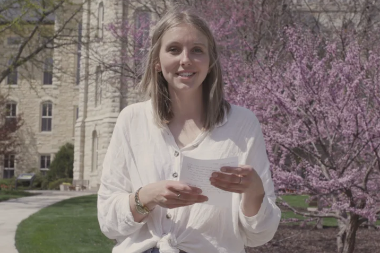 Dear Freshman Series - Girl Holding letter outside Blanchard Hall