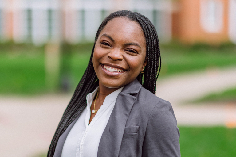 A young black female smiles