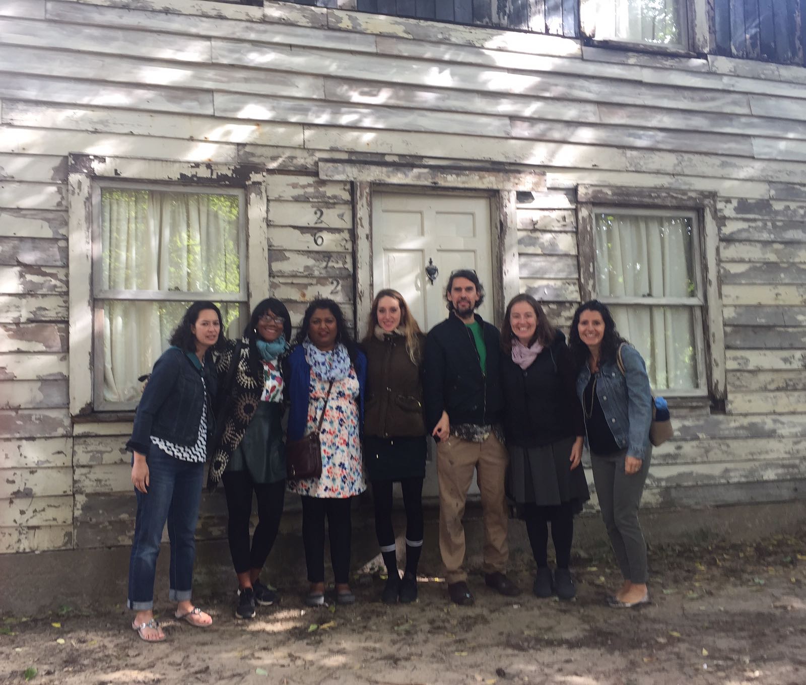 Laura Fabrycky and friends standing in front of a house