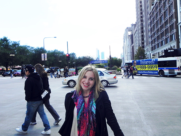 Woman smiling in a street in the city