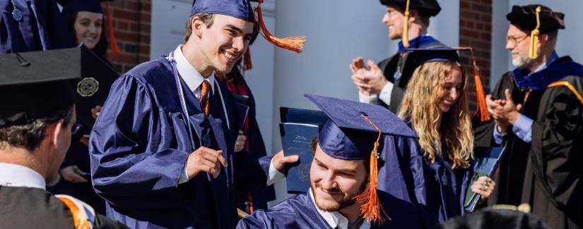 Class of 2025 men leaving Edman