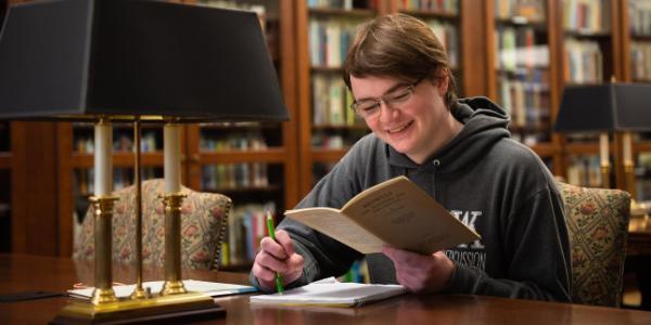 Student reading in the Wade Center